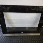 Geam exterior cuptor incorporabil Beko 59 x 46 cm seriile BIM si BIE 210442643 in stare buna / B1